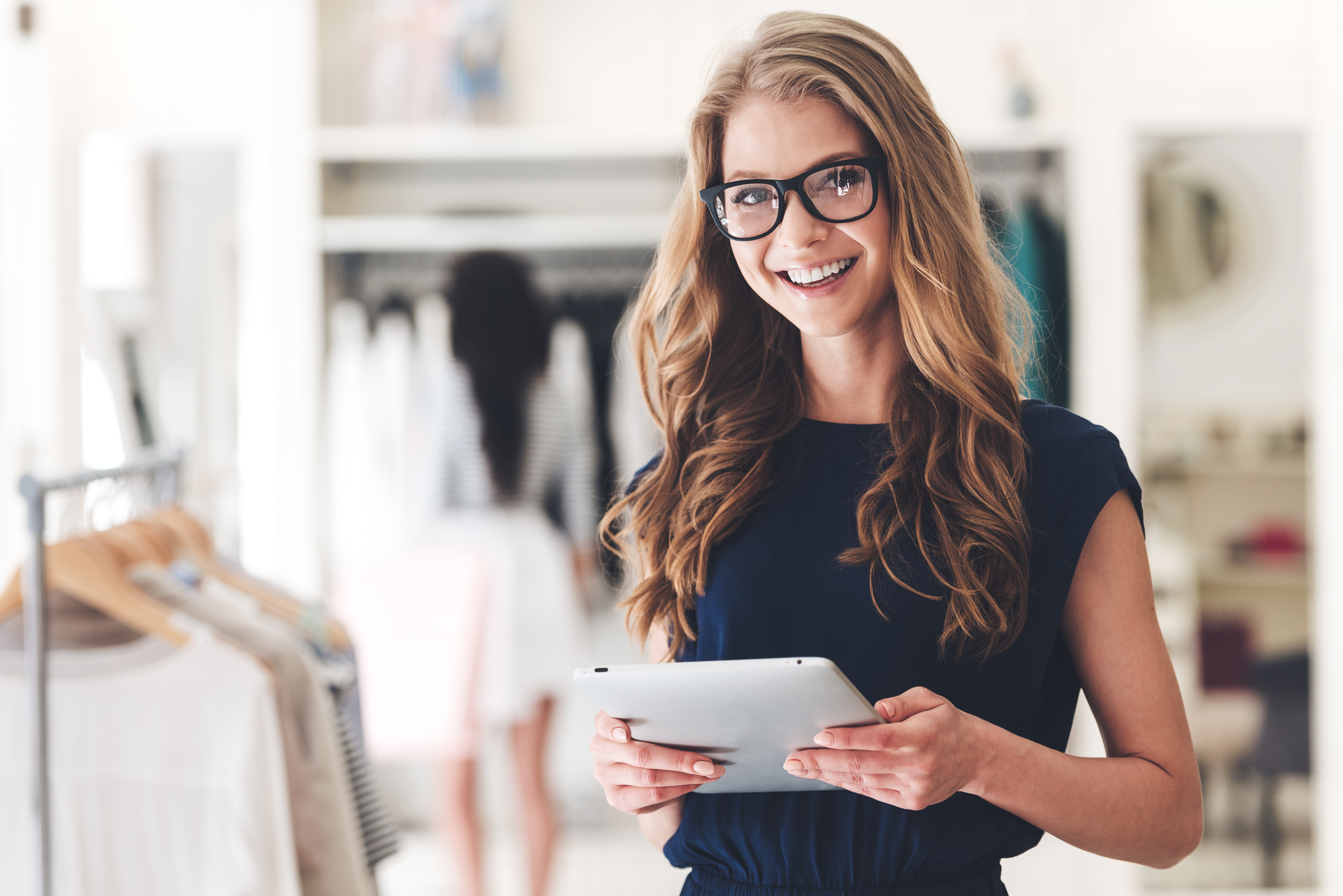 businesswoman holding iPad